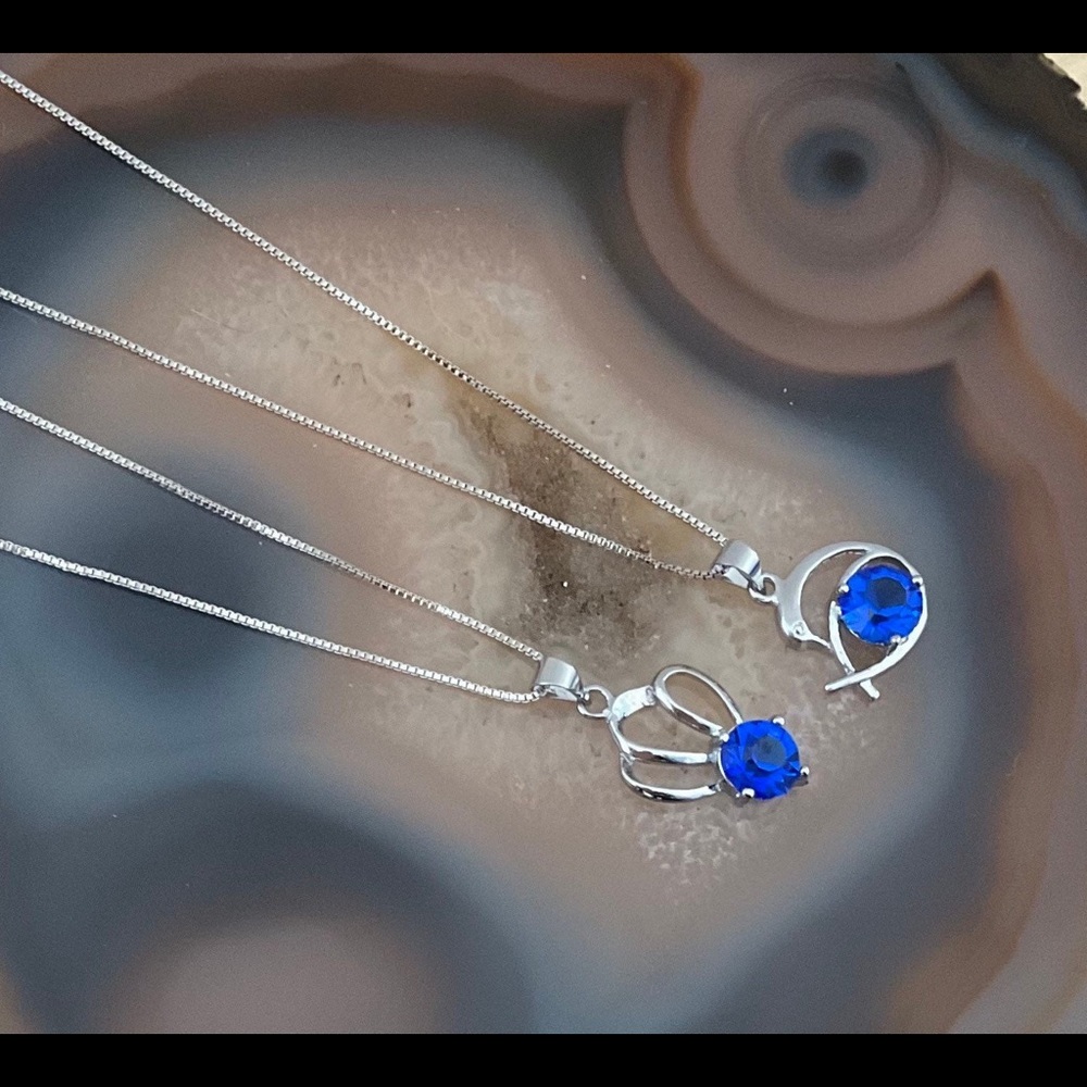 Silver swan necklace blue cz flower pendant gemstone September birthstone